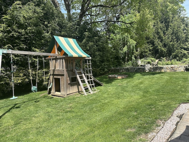 view of play area featuring a yard