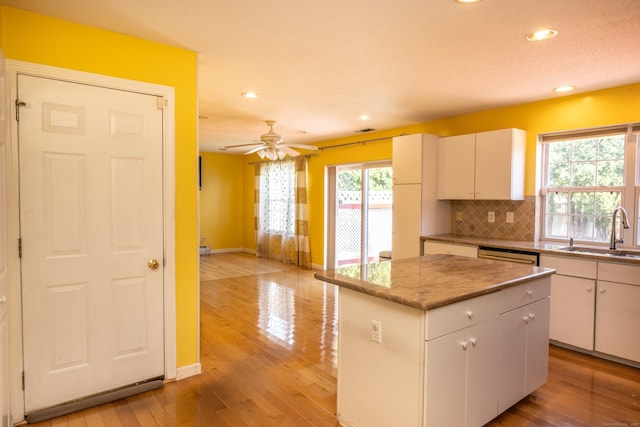kitchen with recessed lighting, a ceiling fan, a sink, and tasteful backsplash