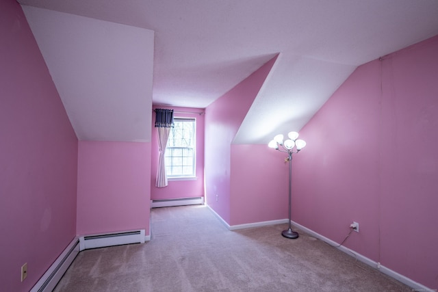 bonus room featuring baseboards, carpet, baseboard heating, and vaulted ceiling