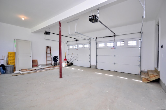garage featuring a garage door opener