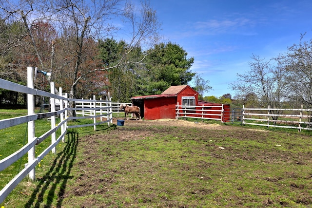 104 S St, Morris, CT 06763 - view of yard featuring an outdoor structure, fence, and an exterior structure