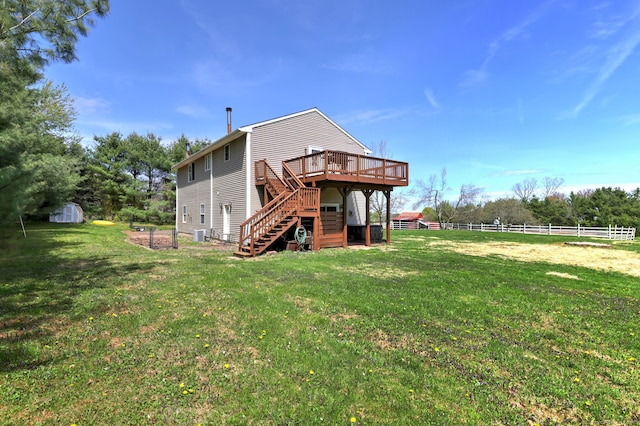 104 S St, Morris, CT 06763 - back of property with a deck, a storage shed, fence, a yard, and stairway
