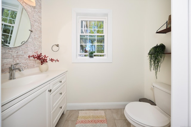 26 Greenwood Dr, Prospect, CT 06712 - bathroom with toilet, baseboards, tasteful backsplash, and vanity
