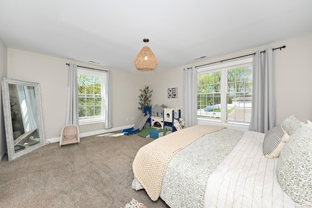 26 Greenwood Dr, Prospect, CT 06712 - bedroom with visible vents, carpet flooring, and baseboards