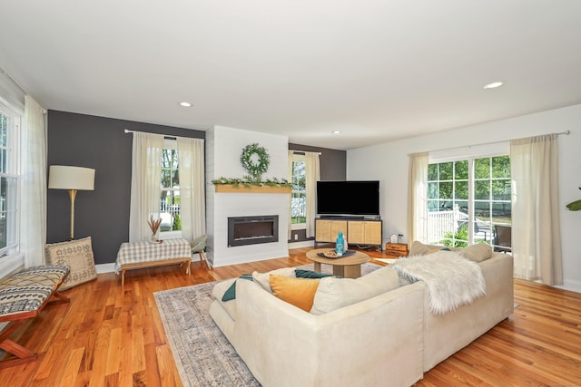 26 Greenwood Dr, Prospect, CT 06712 - living area with recessed lighting, light wood finished floors, baseboards, and a fireplace