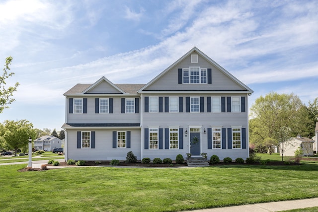 view of front of property with a front lawn