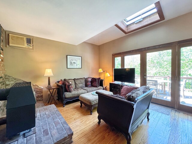 10 Ells St, Norwalk, CT 06850 - living area with french doors, a skylight, plenty of natural light, and light wood-type flooring
