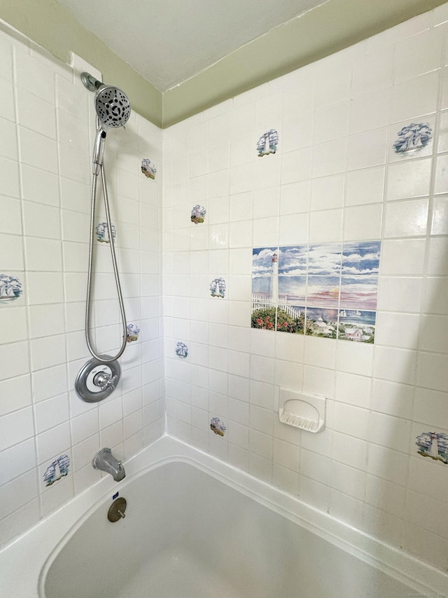 full bath featuring shower / bathtub combination