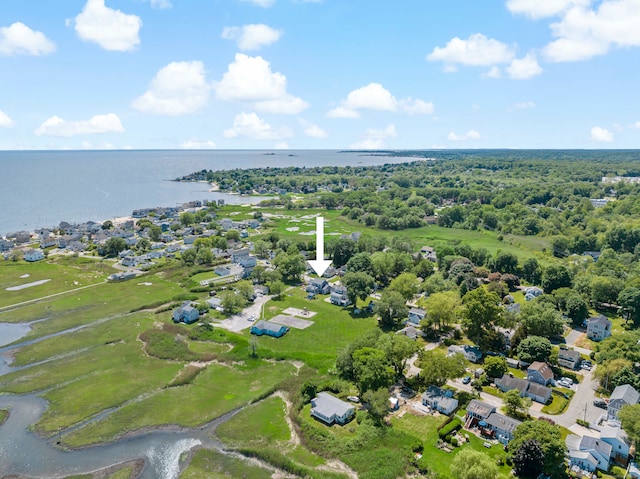 drone / aerial view with a water view and a residential view