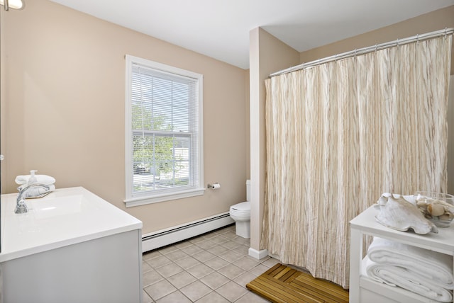 bathroom featuring vanity, toilet, tile patterned flooring, and a baseboard radiator