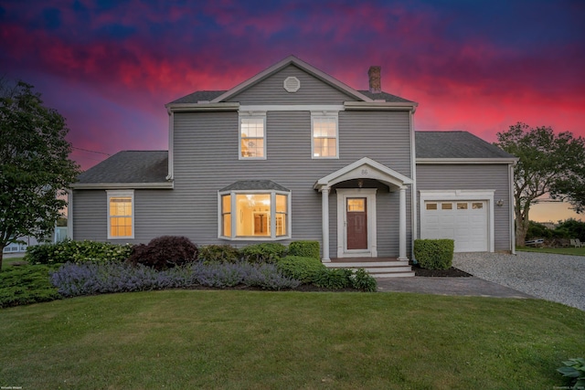 86 Chalker Beach Rd, Old Saybrook, CT 06475 - traditional-style house featuring a chimney, driveway, a garage, and a front lawn