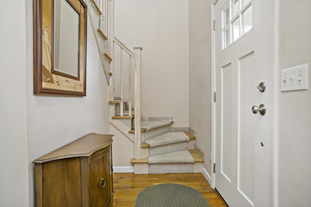 86 Chalker Beach Rd, Old Saybrook, CT 06475 - entryway featuring light wood finished floors, stairs, and baseboards