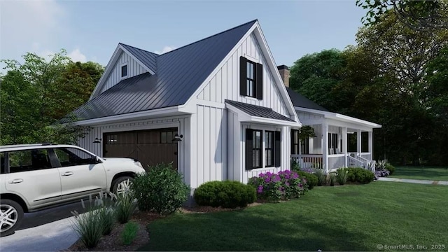 17A Old Stonington Rd, Stonington, CT 06378 - view of property exterior with board and batten siding, a standing seam roof, a porch, a yard, and metal roof