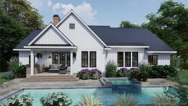 17A Old Stonington Rd, Stonington, CT 06378 - back of house featuring board and batten siding, a standing seam roof, and metal roof