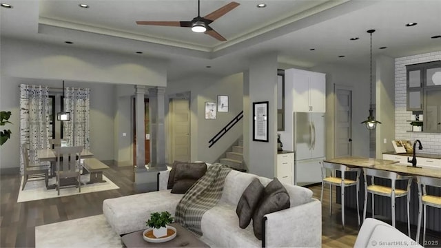 17A Old Stonington Rd, Stonington, CT 06378 - living area featuring dark wood-type flooring, decorative columns, ceiling fan, recessed lighting, and stairs