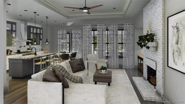 17A Old Stonington Rd, Stonington, CT 06378 - living room featuring wood finished floors, a fireplace, a raised ceiling, and a ceiling fan