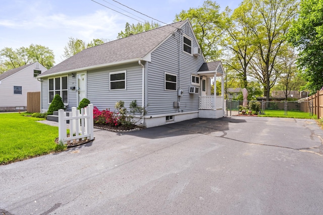 21 Roosevelt Blvd, Enfield, CT 06082 - view of front of house with roof with shingles and cooling unit