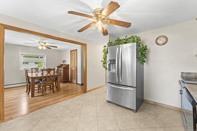 21 Roosevelt Blvd, Enfield, CT 06082 - kitchen featuring stainless steel fridge, baseboard heating, a ceiling fan, baseboards, and dishwashing machine