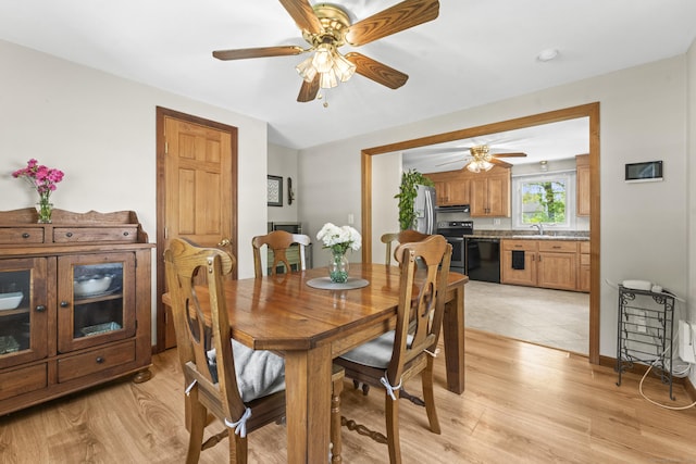 21 Roosevelt Blvd, Enfield, CT 06082 - dining room with ceiling fan and light wood-style floors
