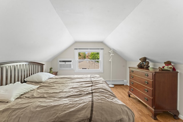 21 Roosevelt Blvd, Enfield, CT 06082 - bedroom with a baseboard radiator, light wood finished floors, an AC wall unit, and lofted ceiling