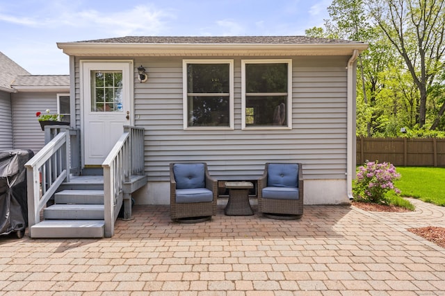 21 Roosevelt Blvd, Enfield, CT 06082 - back of house featuring a patio and fence
