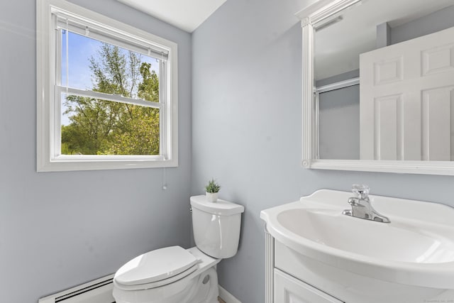 21 Roosevelt Blvd, Enfield, CT 06082 - bathroom featuring baseboard heating, toilet, vanity, an enclosed shower, and baseboards
