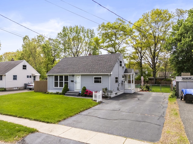 21 Roosevelt Blvd, Enfield, CT 06082 - cape cod-style house featuring a shingled roof, asphalt driveway, and a chimney