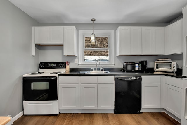 kitchen featuring a sink, white cabinets, electric range, and dishwasher