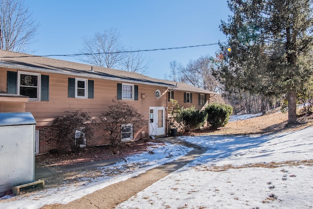 raised ranch with brick siding