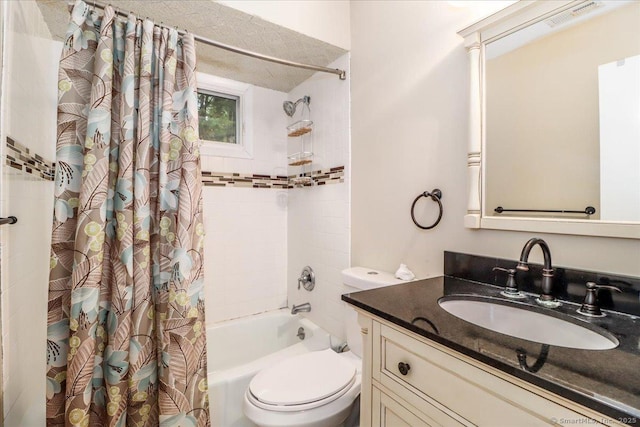 full bathroom featuring vanity, toilet, and shower / bath combo with shower curtain