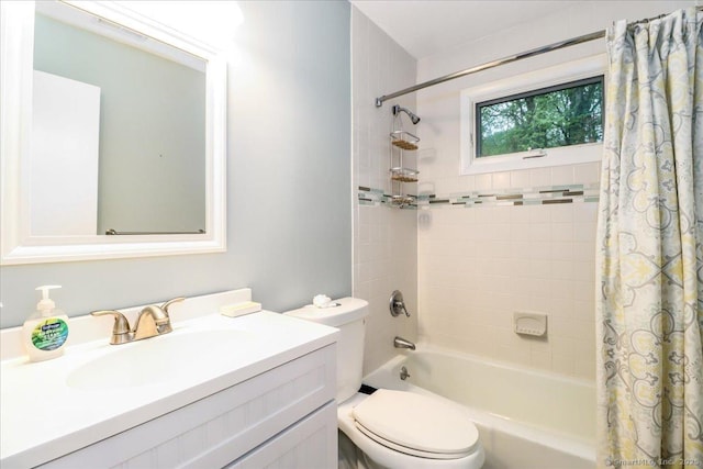 full bathroom with toilet, vanity, and shower / bath combination with curtain