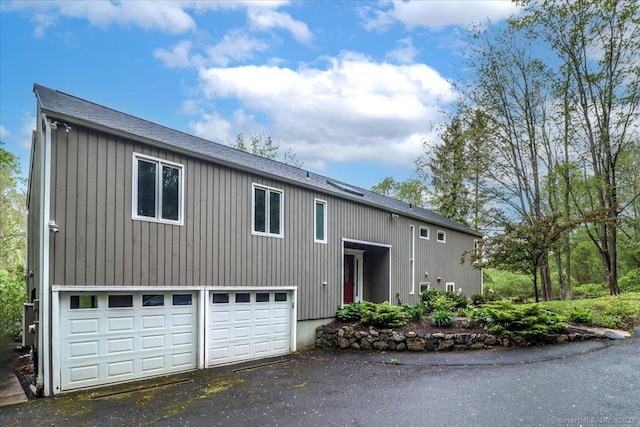 70 Chambers Rd, Danbury, CT 06811 - raised ranch with a shingled roof and asphalt driveway