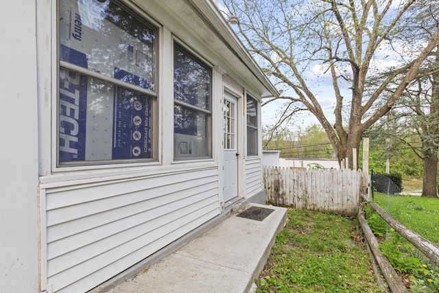 property entrance featuring fence