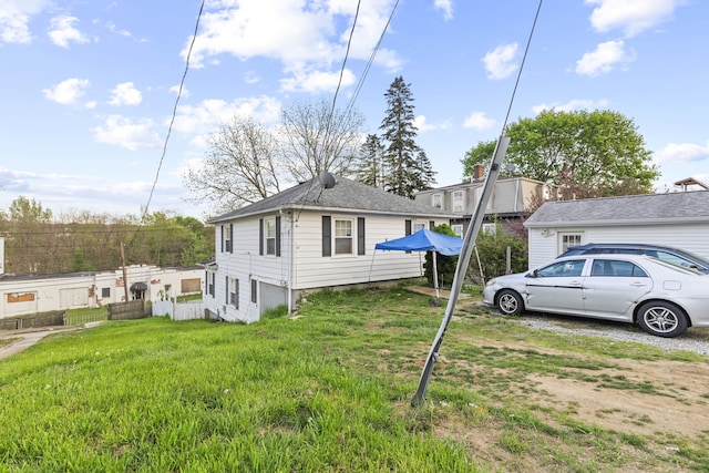view of front of home with a front yard