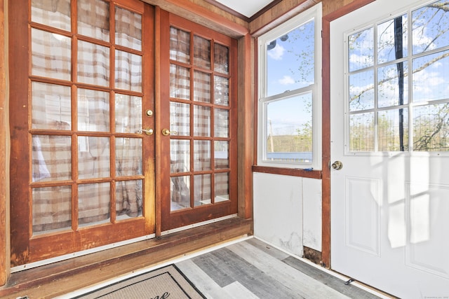 doorway to outside with wood finished floors