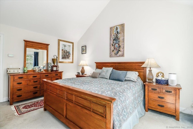 21 Woodcrest Ln Unit 21, Danbury, CT 06810 - bedroom with baseboards, light colored carpet, and vaulted ceiling