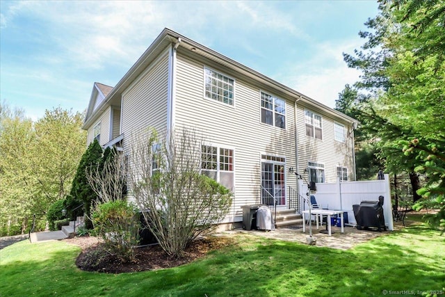 21 Woodcrest Ln Unit 21, Danbury, CT 06810 - back of house featuring a lawn and a patio
