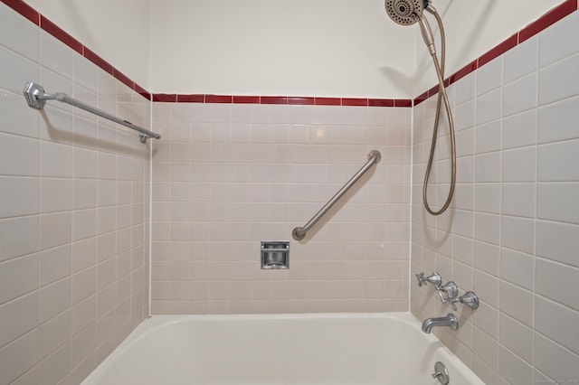 bathroom featuring  shower combination