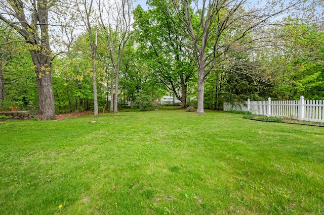 view of yard featuring fence