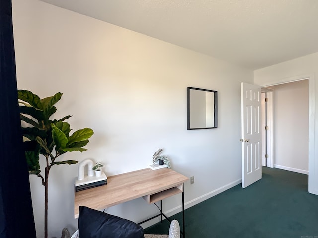 carpeted home office with baseboards
