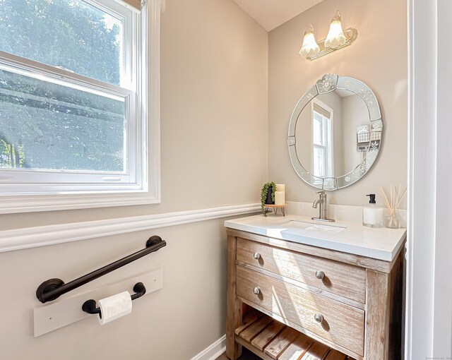 bathroom featuring vanity and plenty of natural light