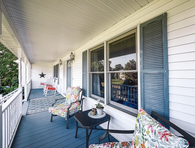 wooden deck featuring a porch