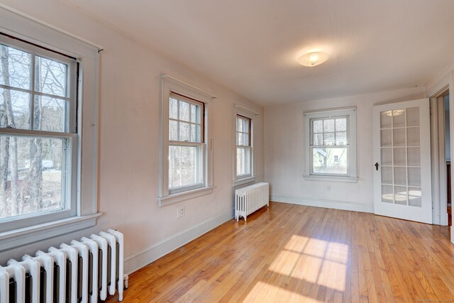 2951 Winsted Rd, Torrington, CT 06790 - unfurnished sunroom with radiator