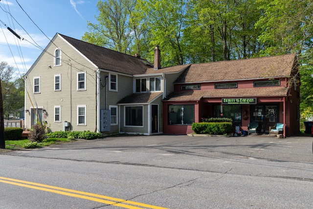2951 Winsted Rd, Torrington, CT 06790 - view of front of property featuring a chimney and a shingled roof