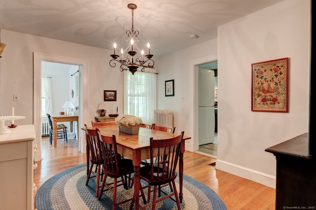 2951 Winsted Rd, Torrington, CT 06790 - dining room with a chandelier and light wood-type flooring