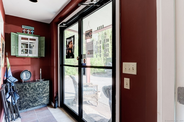 2951 Winsted Rd, Torrington, CT 06790 - doorway with healthy amount of natural light and light tile patterned floors