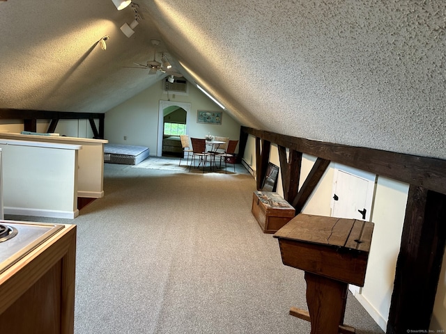 2951 Winsted Rd, Torrington, CT 06790 - bedroom featuring a textured ceiling, vaulted ceiling, and carpet flooring