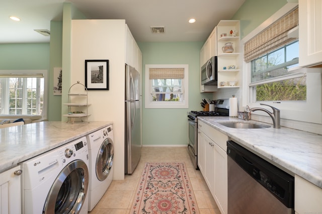 2 Bartholomew Rd, Branford, CT 06405 - kitchen featuring a sink, stainless steel appliances, open shelves, visible vents, and white cabinetry
