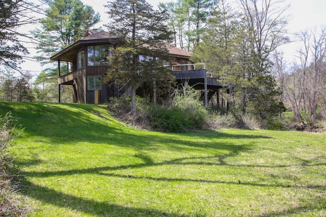 view of yard with a deck