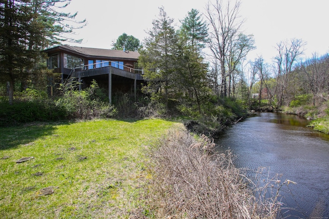 view of yard featuring a wooden deck